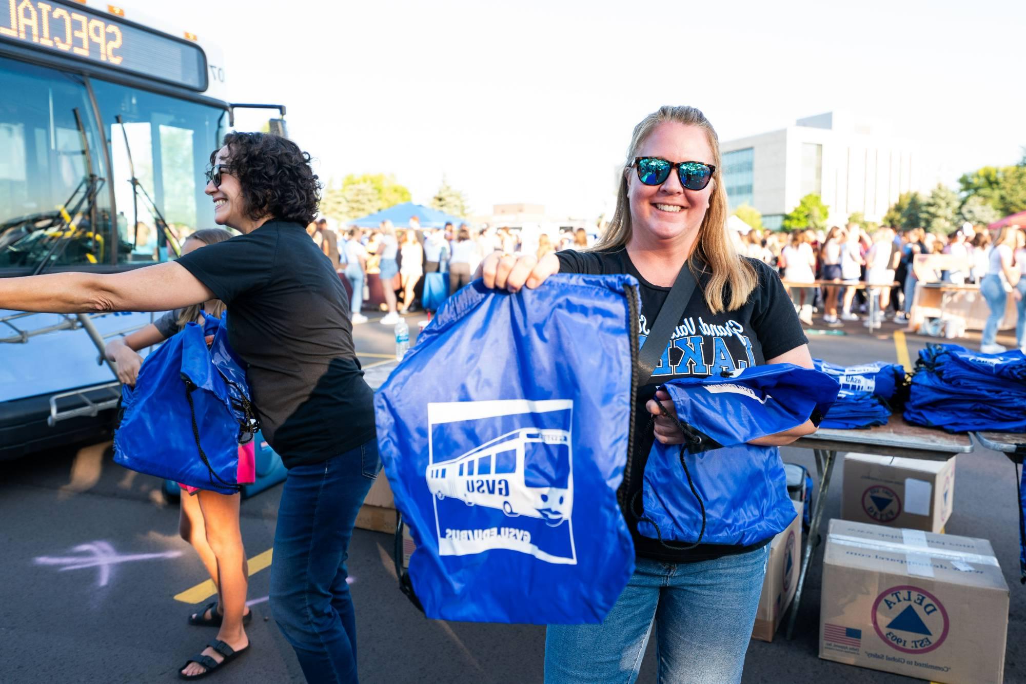 Women shows the bag giveaway